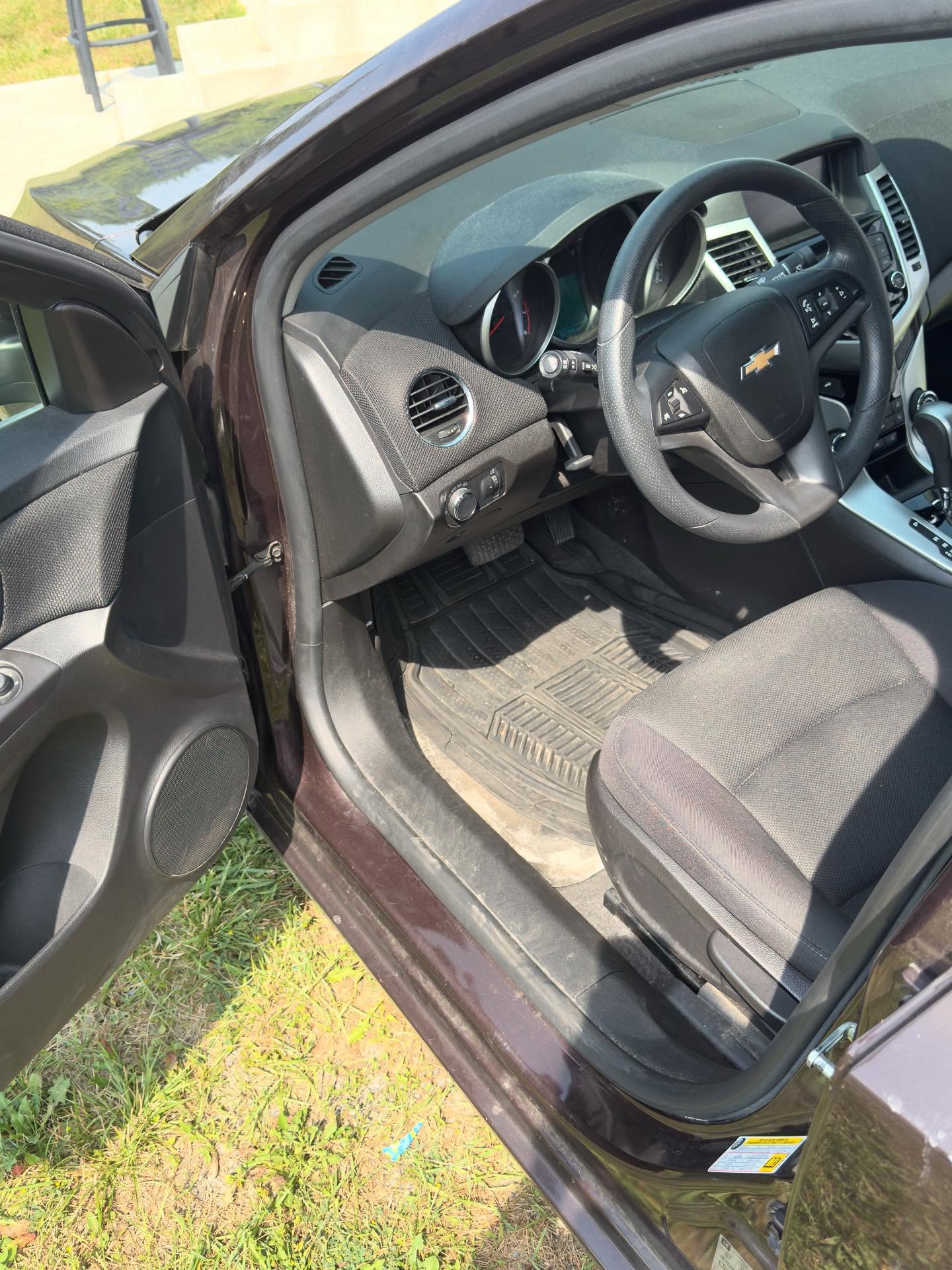 RSK Auto Detailing — Chevy Cruze interior before detailing, driver side view