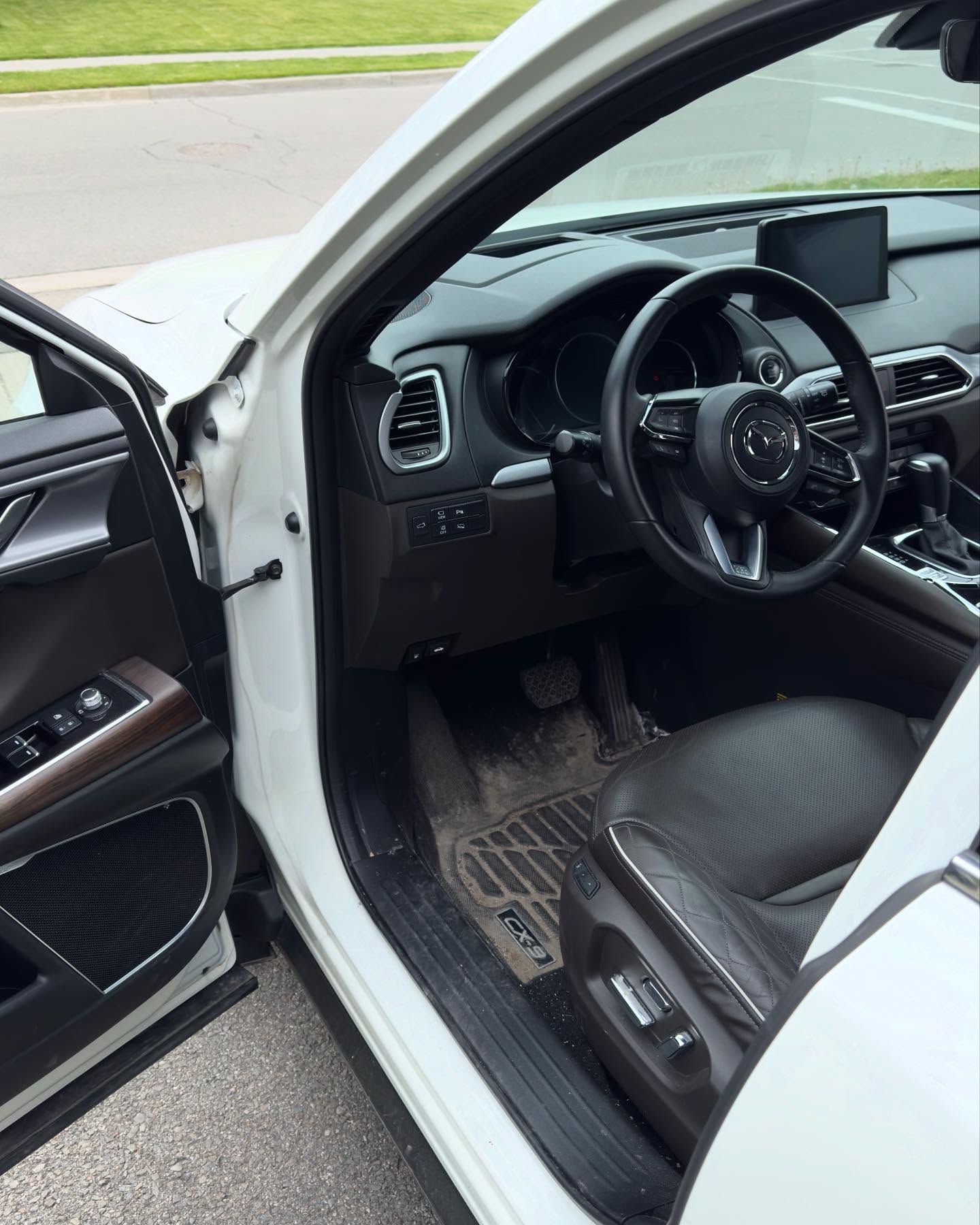 RSK Auto Detailing — Mazda CX-9 interior before detailing, dirty floor mats