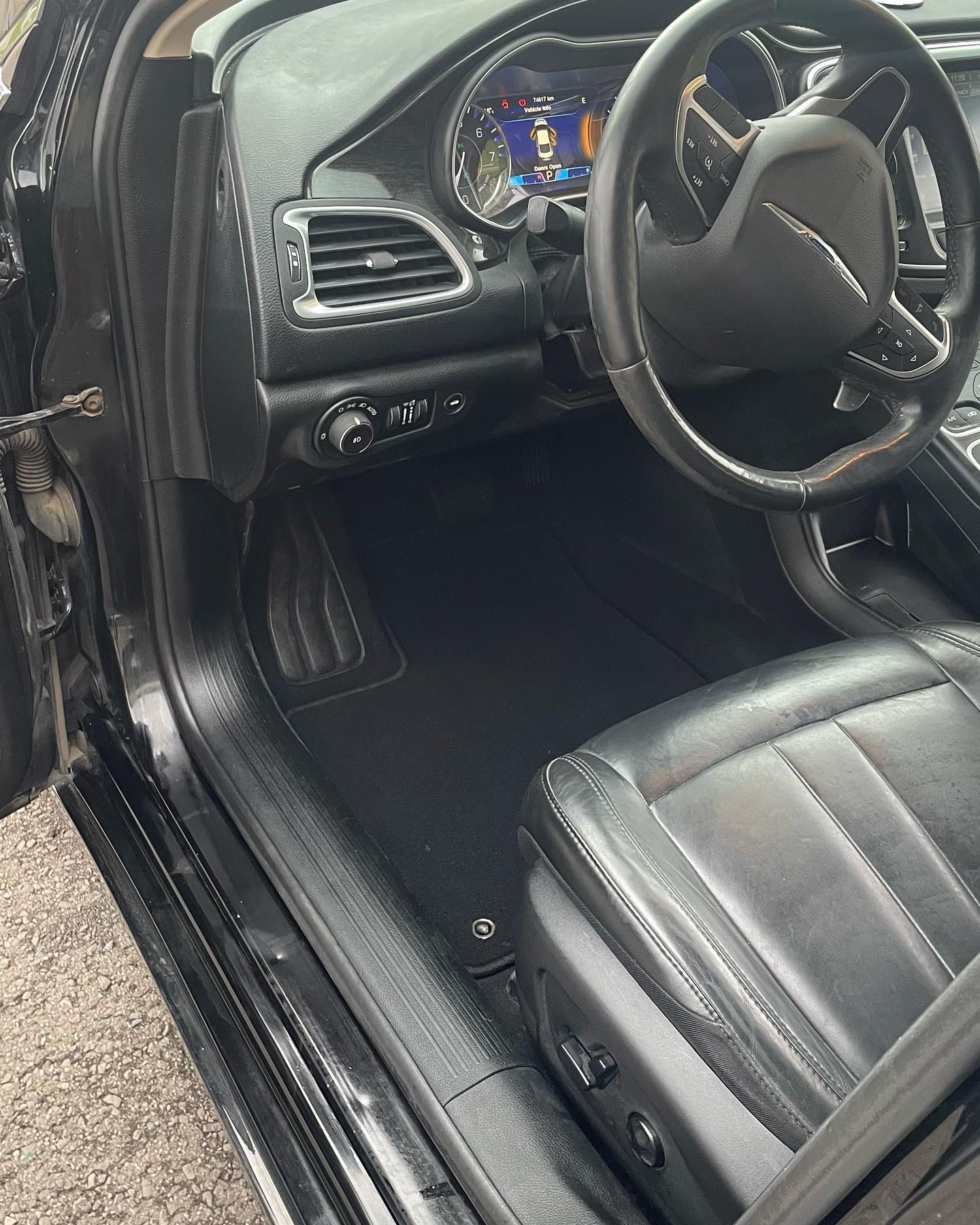 RSK Auto Detailing — Chrysler 200 interior after detailing, clean mats and restored surfaces